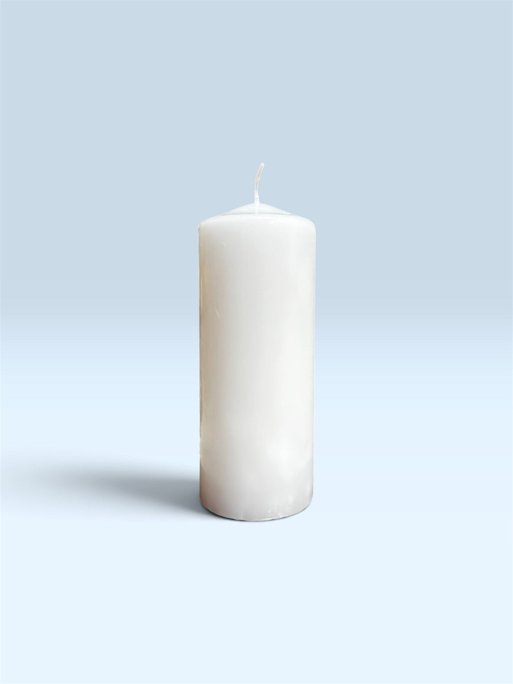 Candles Plus classic white cylindrical pillar wax candle with a minimalist design for home decor and ambient lighting.