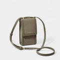 Small olive green crossbody bag on a light gray background